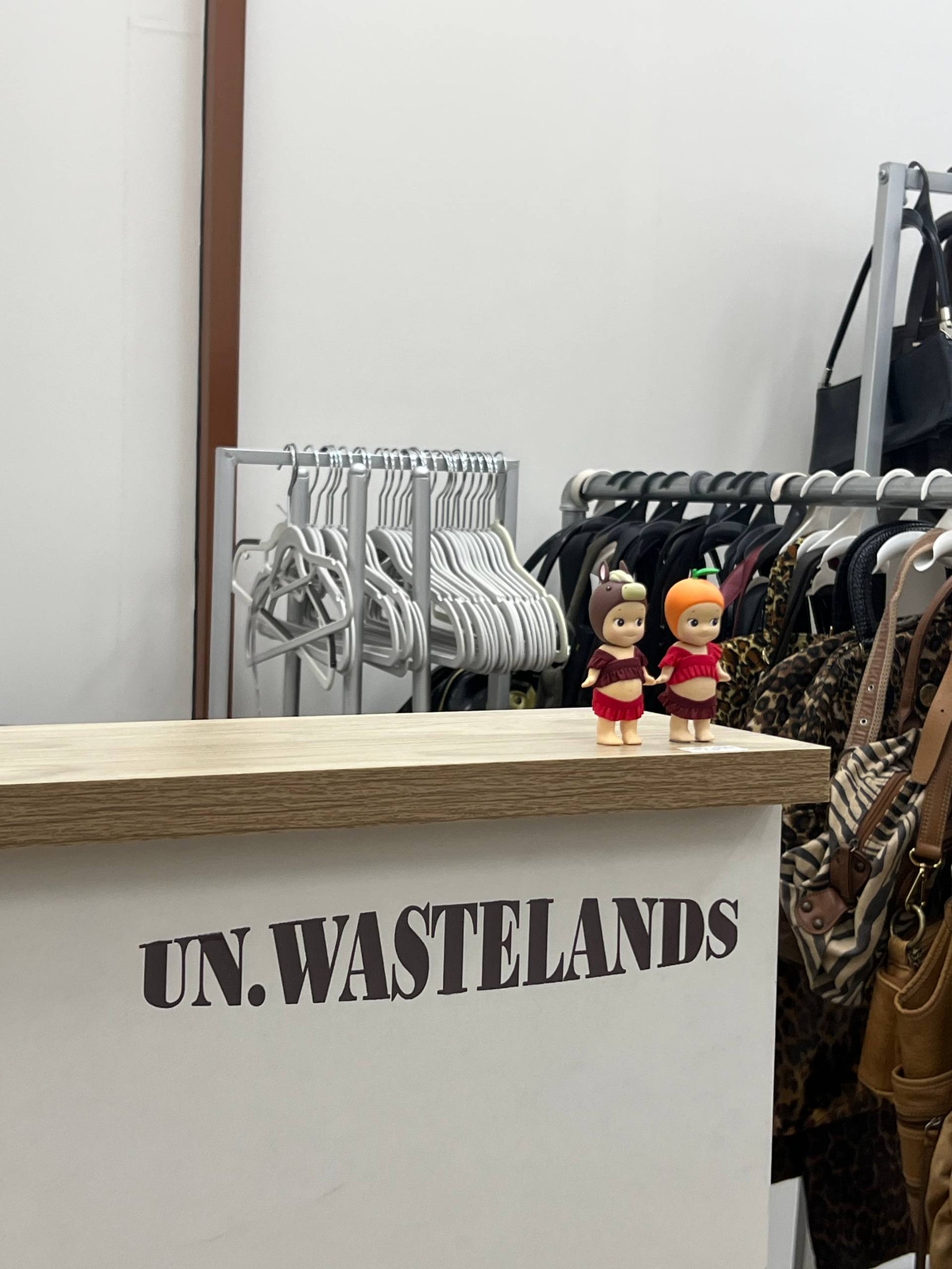 Curated vintage clothing at UN.WASTELANDS Queensway Shopping Centre